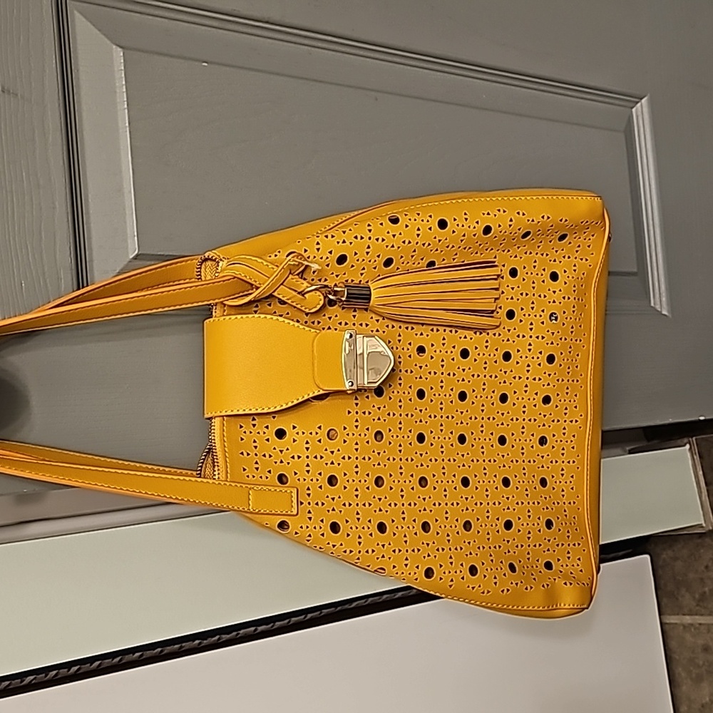 New bag, leather very nice paid 99$ for it